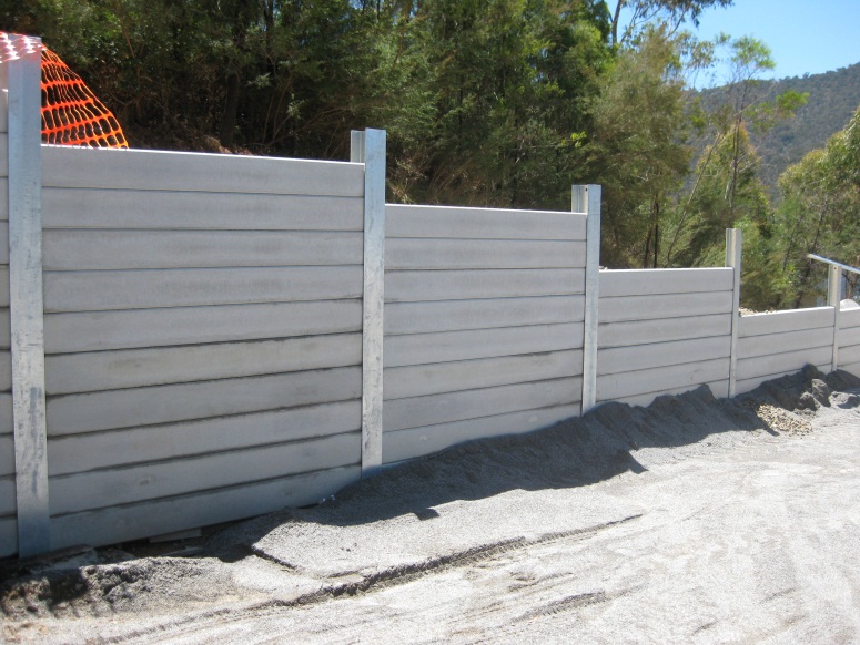 newly built concrete sleeper retaining wall